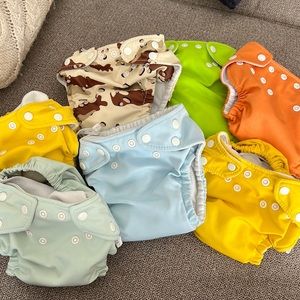7 cloth diapers with inserts- one size